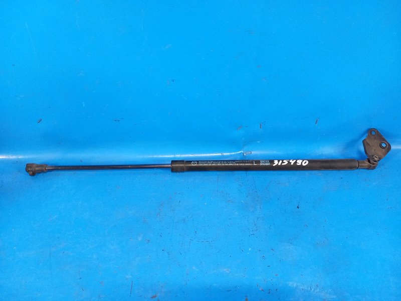 Hood shock absorber MAZDA 3 BL 09-13 2009 Left.