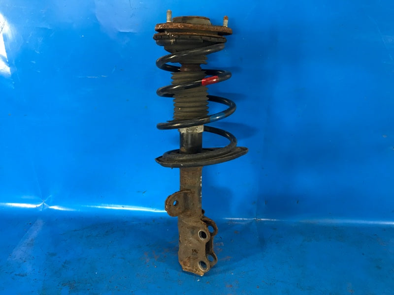 Shock absorber TOYOTA PRIUS PLUS 11-14 2013 Left. Front.