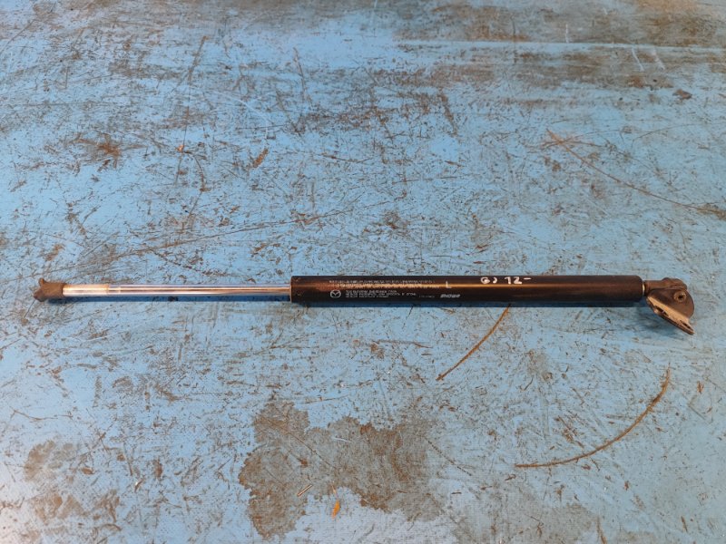 Trunk lid shock absorber MAZDA 6 GJ 12- Left.