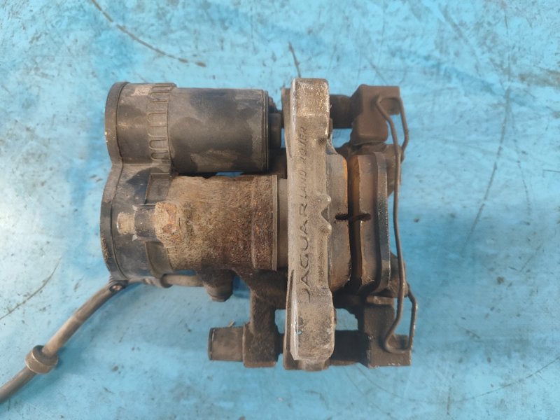 Brake caliper LAND ROVER EVOQUE 19- Left. Rear.