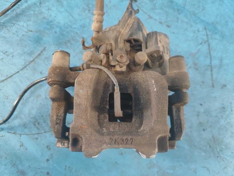 Brake caliper LAND ROVER EVOQUE 19- Right Rear.